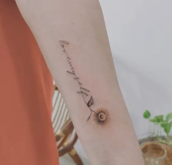 simplistic sunflower tattoo