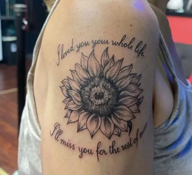 single sunflower tattoo with wording