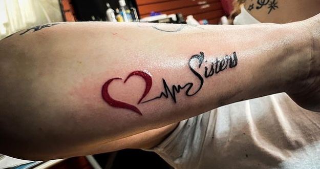 sister wording tattoo with a heart