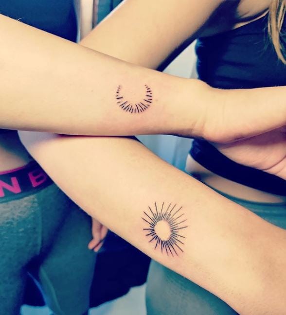 sisters with sun and moon tattoos