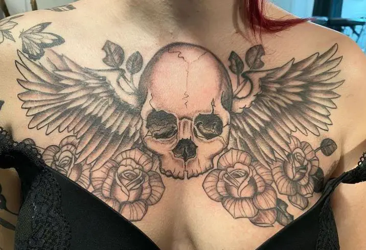 skull chest tattoo with wings