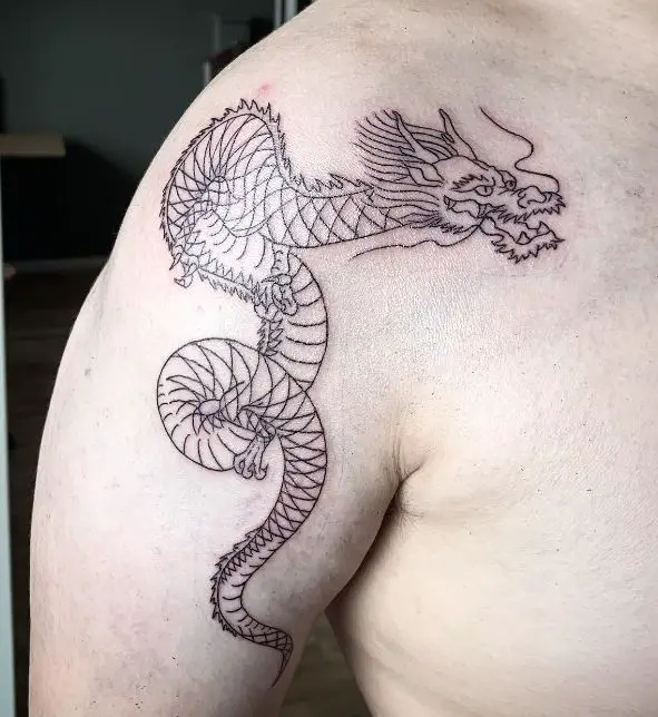 small dragon shoulder tattoo
