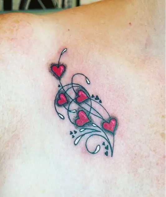 small hearts tattoo on the chest