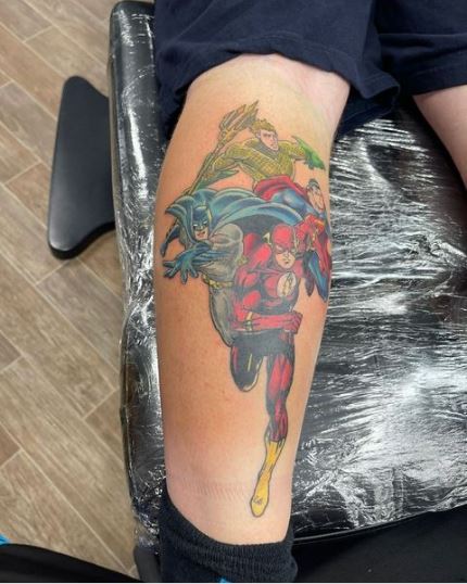 Batman, Robin, Flash, and Superman Leg tattoo