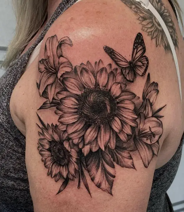 sunflower and butterfly tattoo with shading
