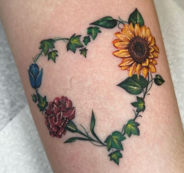 sunflower and carnation tattoo