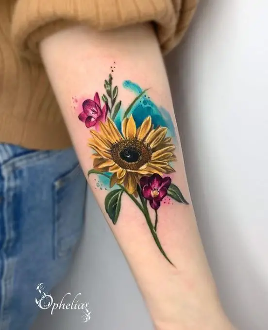 sunflower and freesias tattoo in vibrant colours