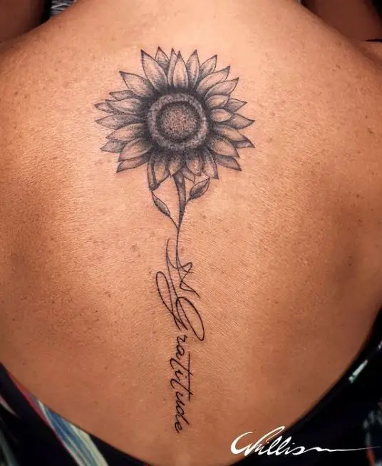 sunflower and wording tattoo