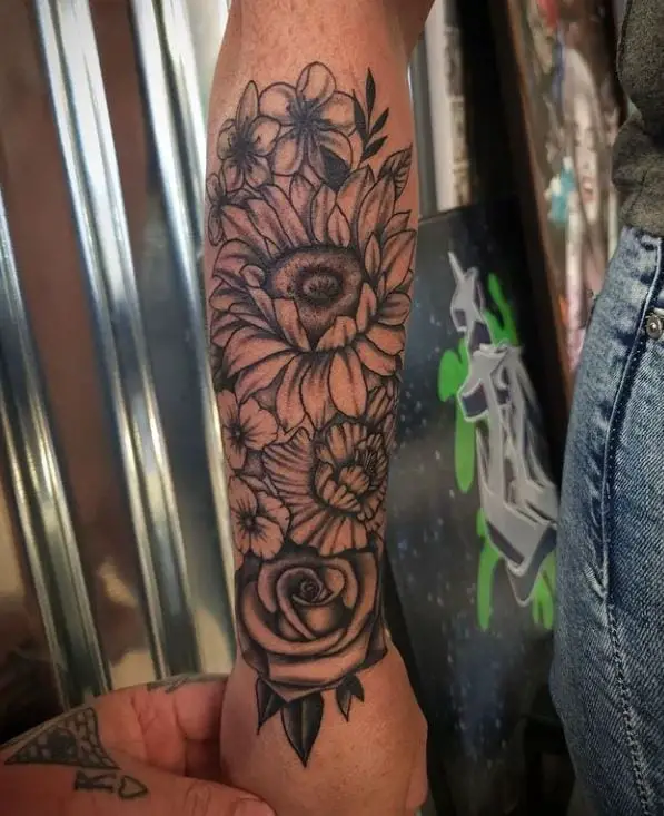 sunflower arm tattoo in black