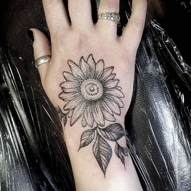 sunflower hand tattoo