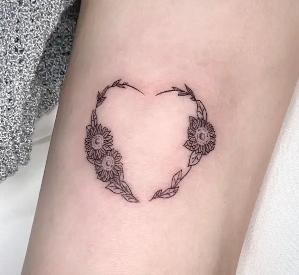 sunflower heart tattoo in black