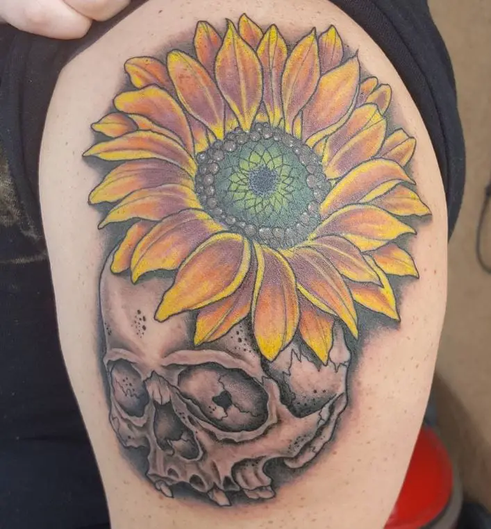 sunflower on a skull tattoo
