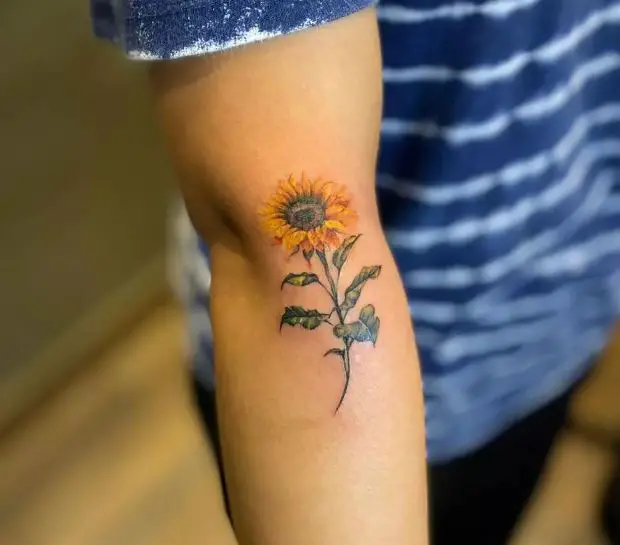 sunflower tattoo on the hand