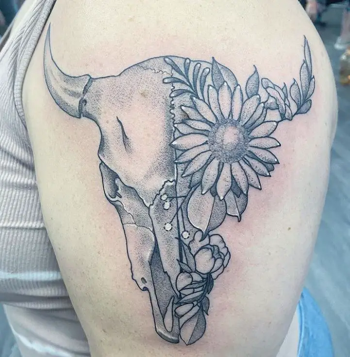 sunflower with a cow skull tattoo