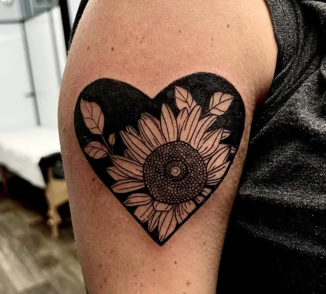 sunflower within a heart tattoo