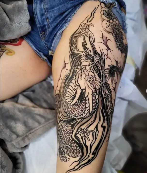 thigh dragon tattoo
