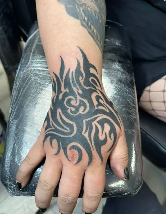 tribal hand tattoo