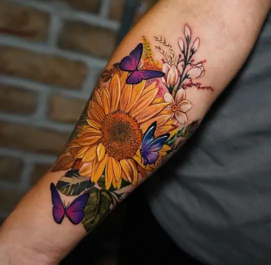 vibrant sunflower tattoo with butterflies