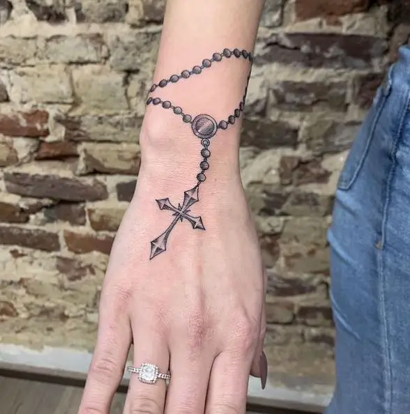 wrist chain tattoo