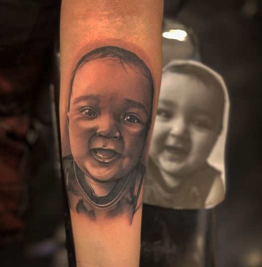 Baby Portrait Sleeve Tattoo