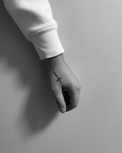 Black Cross Wrist Tattoo