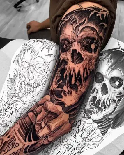 Black Ink Skull Sleeve Tattoo