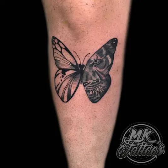 Butterfly and tiger shin tattoo