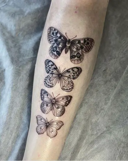 Collection of butterflies shin tattoo