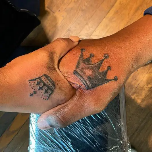 Black king crown tattoo on upper hand by Captainbret