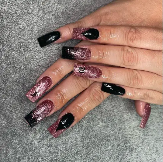 Black nails with one glitter outlet nail