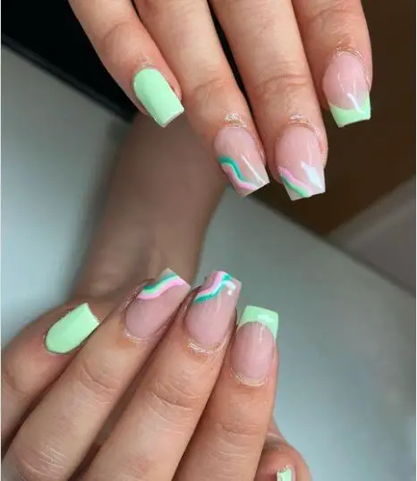 Green Swirls and French Tip Nail Art