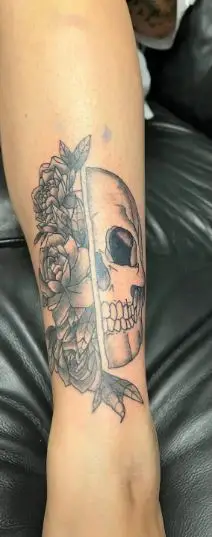 Half Flowers and Skull Tattoo