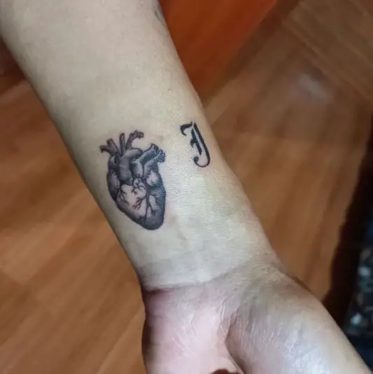 Realistic Heart Wrist Tattoo