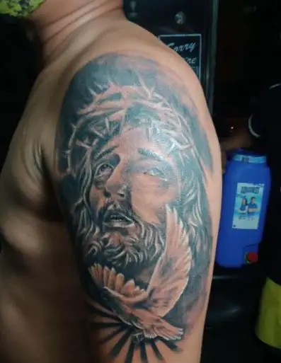 Jesus and Dove Sleeve Tattoo