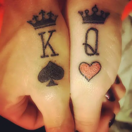 matching king and queen finger tattoos
