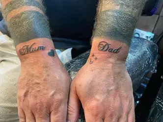 side writing tattoos for men