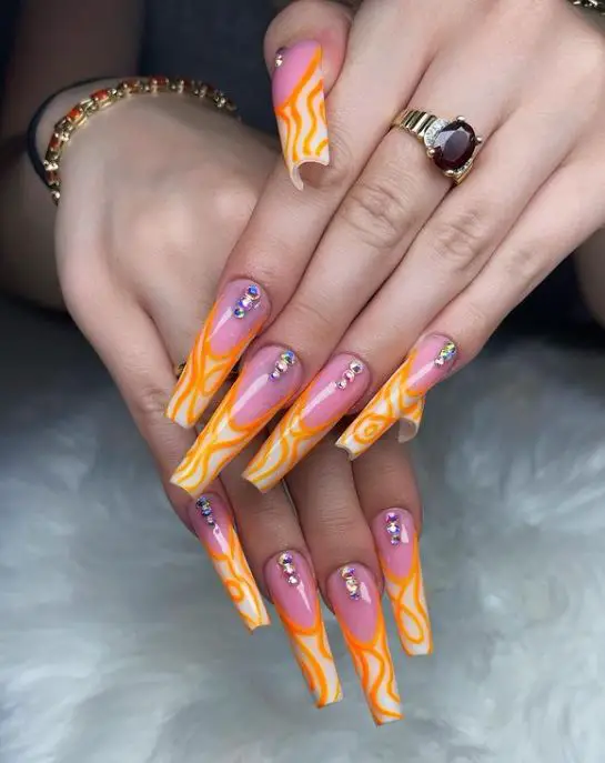 Orange Swirl Nails with Diamonds