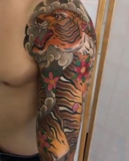 Orange Tiger Sleeve Tattoo