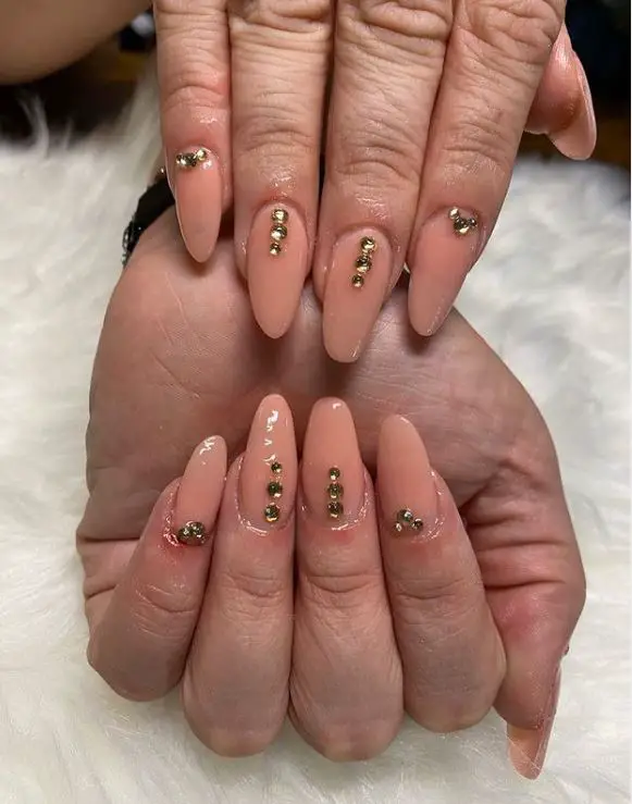 Plain Almond Nails With Gold Diamond