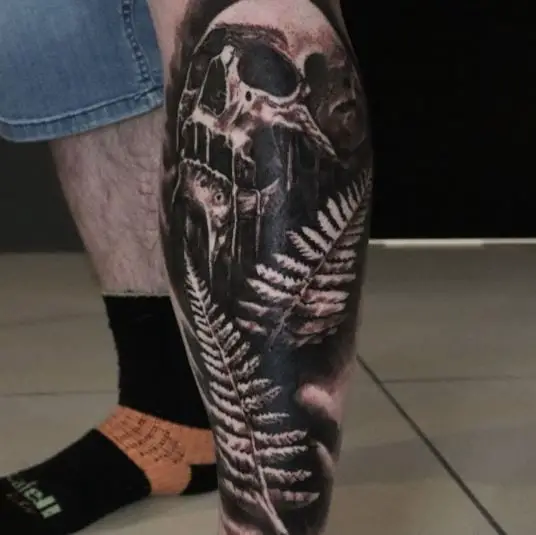 Skulls and ferns right on the shin
