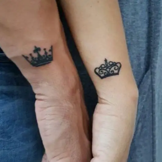 Tiny Black Crown Tattoo