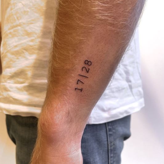 Tiny Date Tattoo on the Forearm