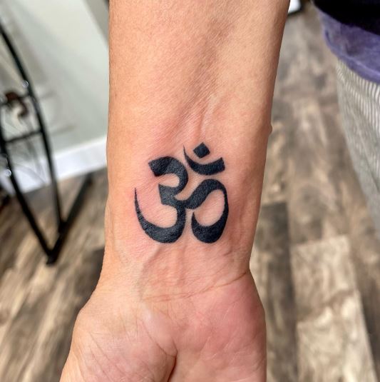 ohm Design Wrist Tattoo