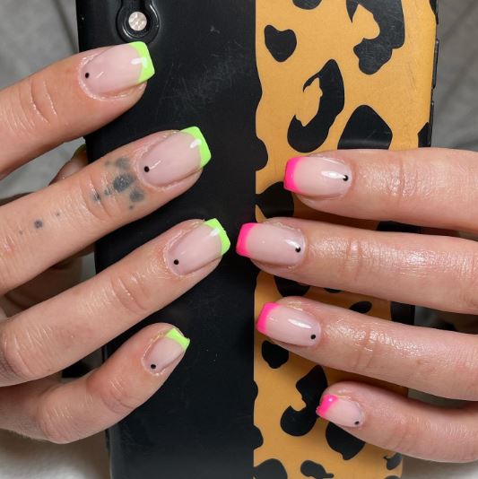 pink and green gel nails with black dots