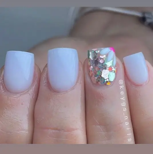 short acrylic nails with silver glitter