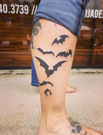 Black Flying Bats Leg Tattoo