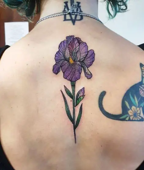 Violet Flower Spine Tattoo