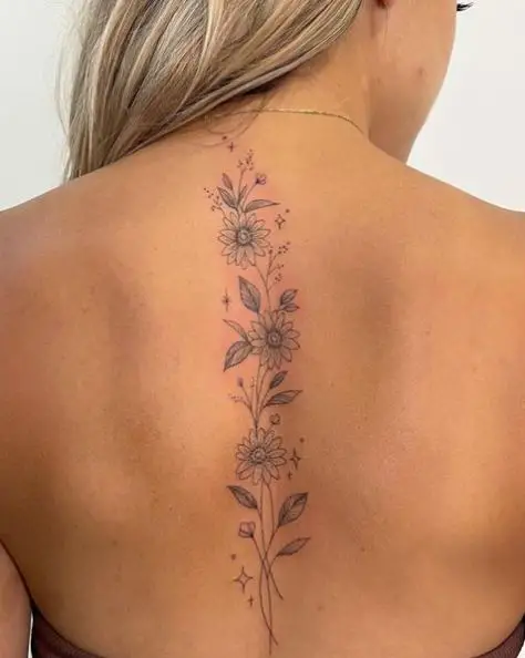 Grey Flowers Spine Tattoo