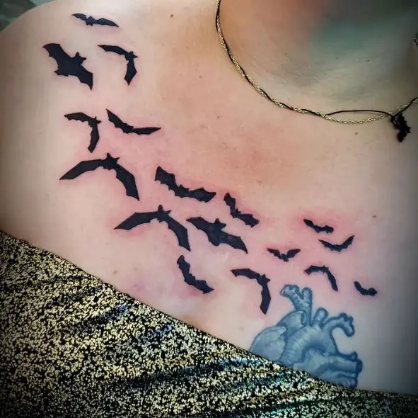 Black Flying Bats Chest Tattoo