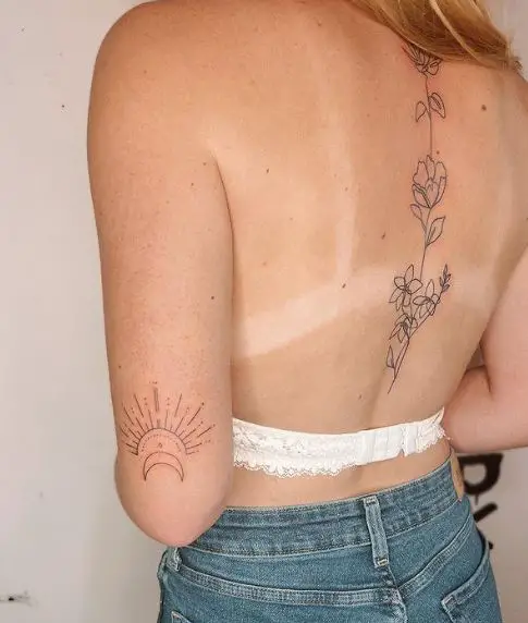 Line Work Flowers Spine Tattoo